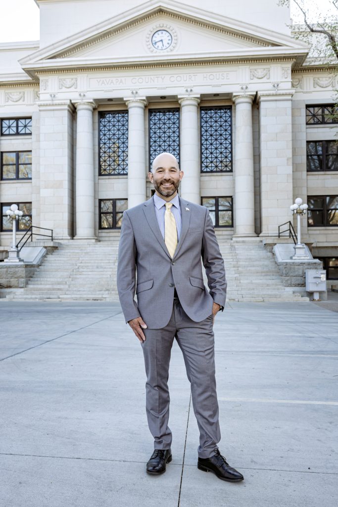 A photo of Mark Kille from Mingus Mountain Law Group in front of the Prescott Courthouse